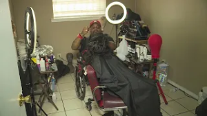 Man paralyzed from shooting opens new beauty salon