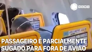 Passenger Partially Sucked Out of Plane During Flight