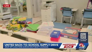 WDSU Anchor Travers Mackel shows school supplies donated to Prosperity Center