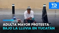 Senior citizen's water debt forgiven after protesting in the rain in Yucatán