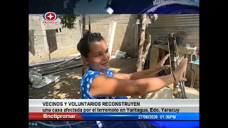 Neighbors and volunteers rebuild a house affected by the earthquake in Yaritagua, Yaracuy State