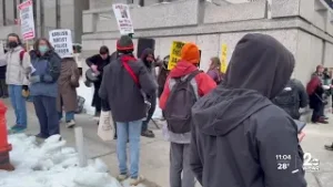 Baltimore residents hold musical protest outside ICE office