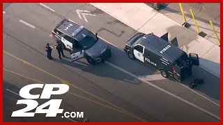 Toronto police officer shot while responding to robbery | Here's what we know so far