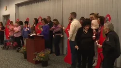 Families gather for candlelight vigil in honor of Domestic Violence Awareness Month