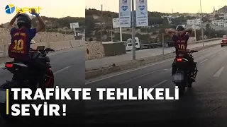 DANGEROUS RIDING IN TRAFFIC!