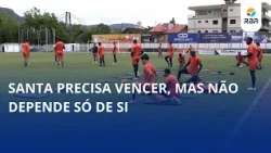 Ball at the feet and calculator in hand