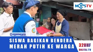 MEGAMENDUNG MIDDLE SCHOOL STUDENTS DISTRIBUTE INDONESIAN FLAGS TO RESIDENTS