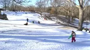 Kids make the most of snow day as schools to stay closed on Monday