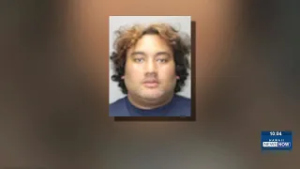 ‘Armed and dangerous’ man arrested in connection with abuse case