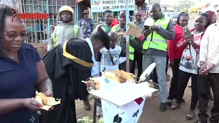 Richard Mbugua graduates with an ICT degree after selling maize to pay his school fees