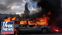 Paris rioters loot, set buildings ABLAZE