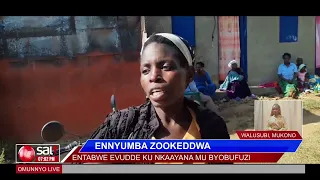 ENNYUMBA ZOOKEDDWA: Entabwe evudde ku nkaayana mu byobufuzi.