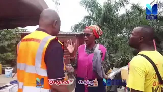 Ga South MCE arrests a man during the National Sanitation Day exercise at Tuba Junction
