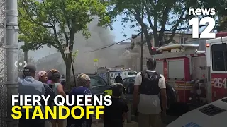 2 family members found dead after Queens explosion and armed standoff