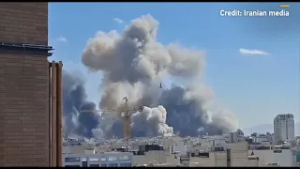 Smoke rose from downtown Tehran after the explosion