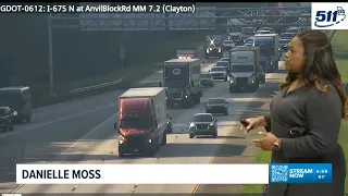 Lanes starting to reopen after car fire on I-675