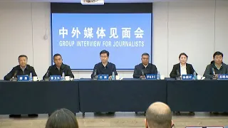 Foreign journalists visit the site of the mudslide disaster