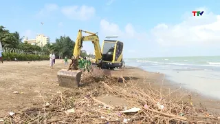 Cleaning up Sam Son beach after heavy rain