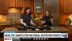 Dietician Karolin Saweres makes a balanced meal during National Nutrition Month
