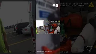 DOG RESCUED FROM HOT TRUCK
