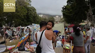 Venezuelans gather humanitarian aid and volunteer for rescue efforts