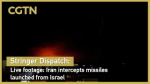Stringer Dispatch: Live footage: Iran intercepts missiles launched from Israel
