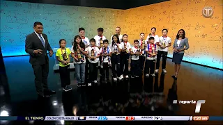 Math whiz kids show off their international championship awards