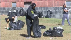 Students clean up campus after homecoming week shootings