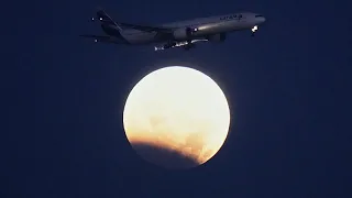 Near-total lunar eclipse as moon passes through Earth's shadow