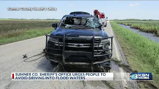 Flood claims patrol vehicle during rescue effort in Kansas