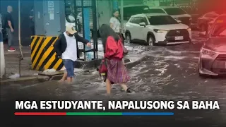 Mga estudyante lumusong sa baha matapos ang malakas na ulan