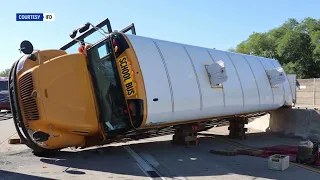 School bus overturns on 465; multiple children, adults hurt