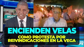 Candlelight vigil as part of a protest in La Vega