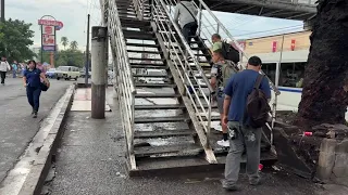 Clear sidewalks after urban reorganization in Soyapango