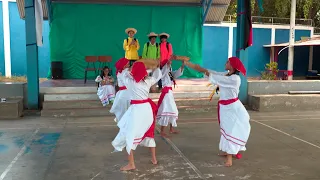 Students highlight the huipil in a theater play