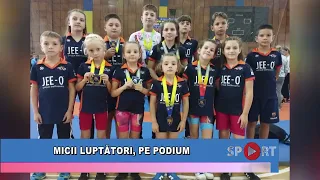 Micii luptători, pe podium