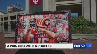 Local artist unveils painting honoring Fernando Mendoza